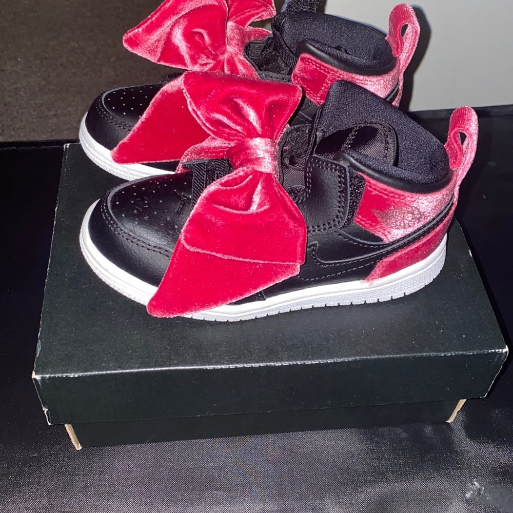Pink bow Jordan 1s